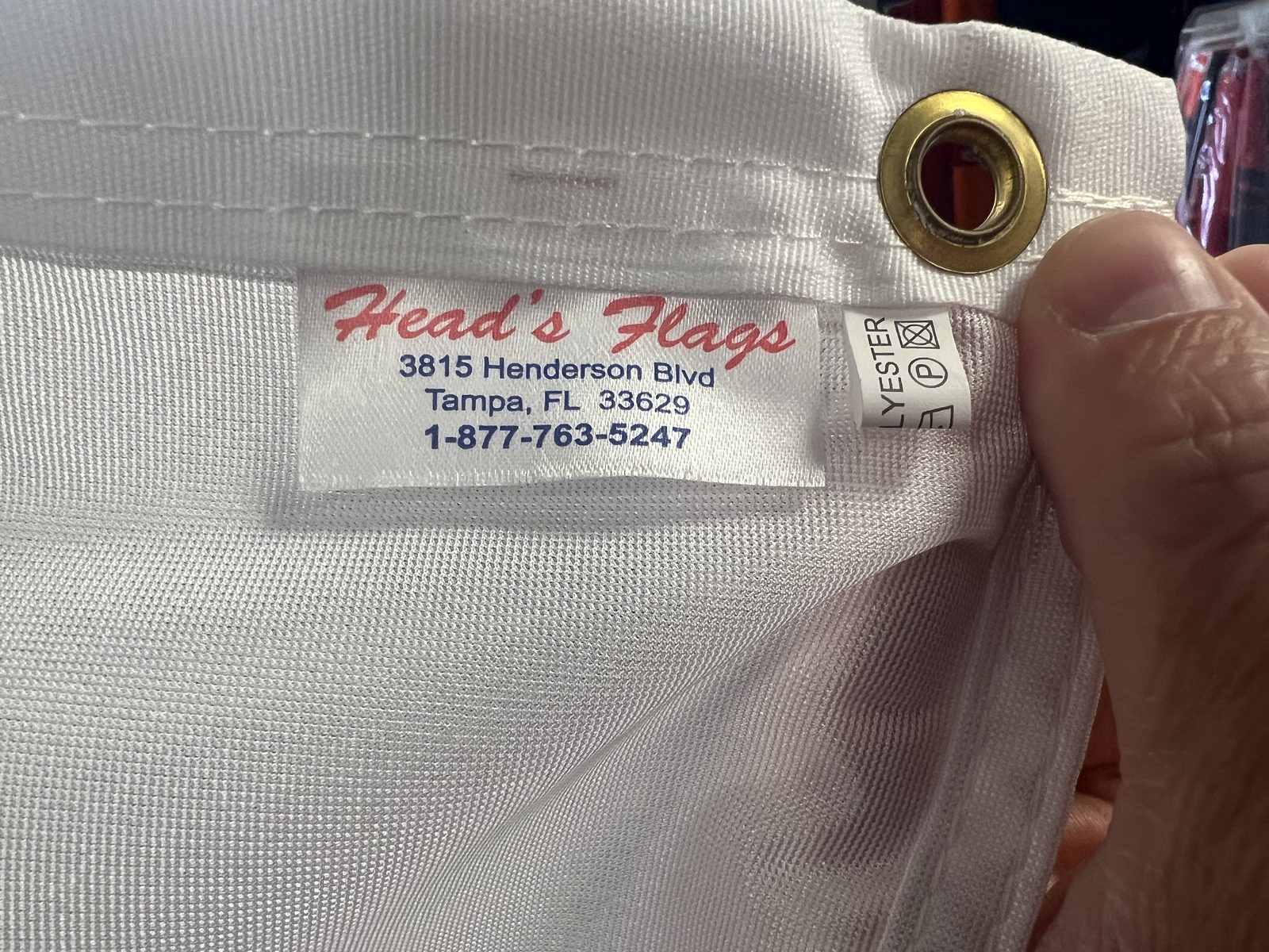 Head's Flags label sewn into a flag header