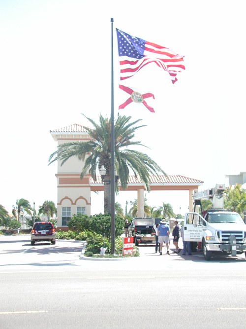 Flagpole at a community entrance