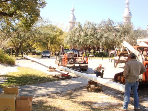 Head's Flags crew setting a flagpole near the University of Tampa minarets