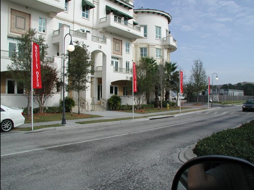 Custom street-pole banners along a Tampa boulevard