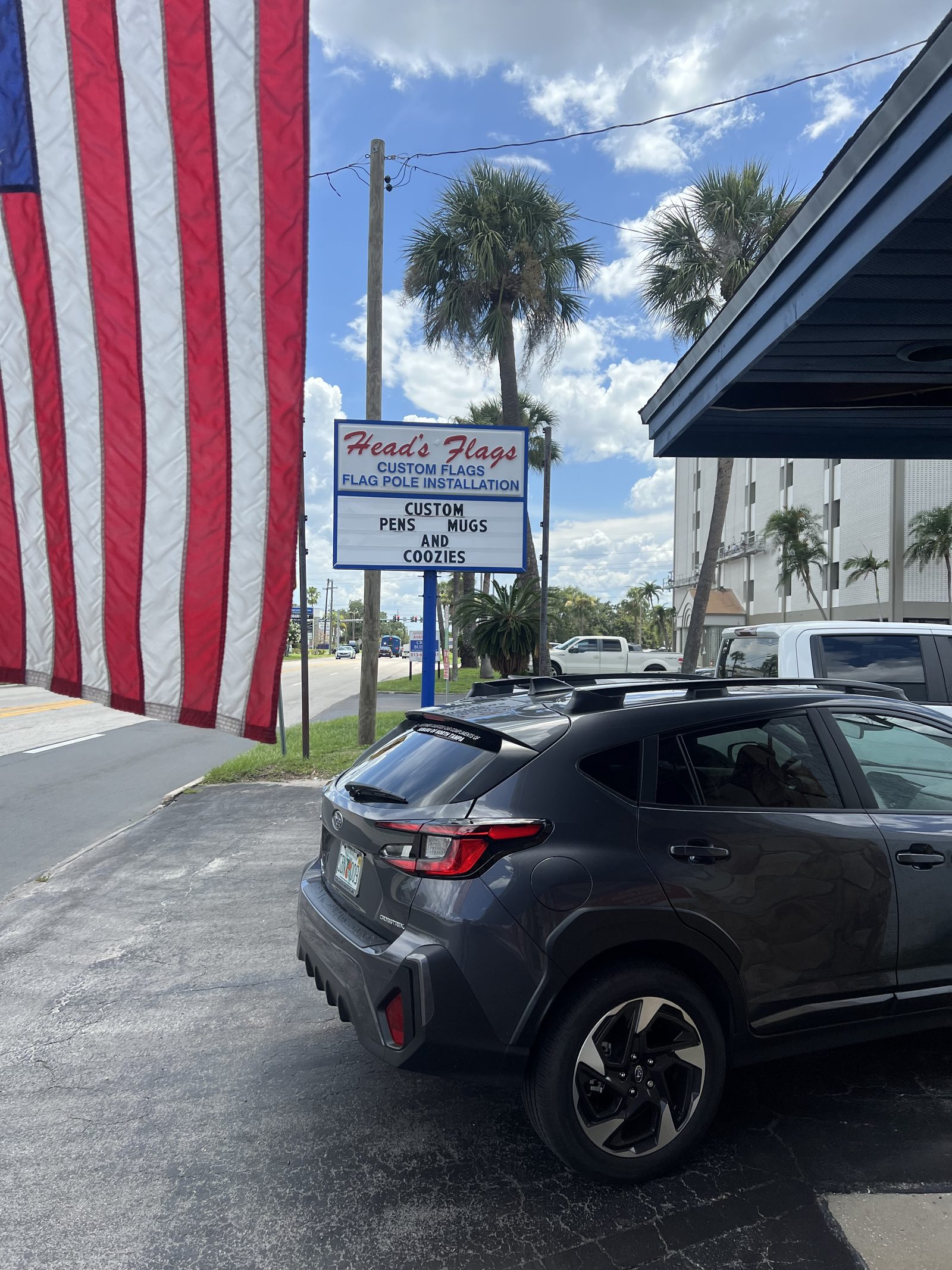 Flags flying outside the Head's Flags shop