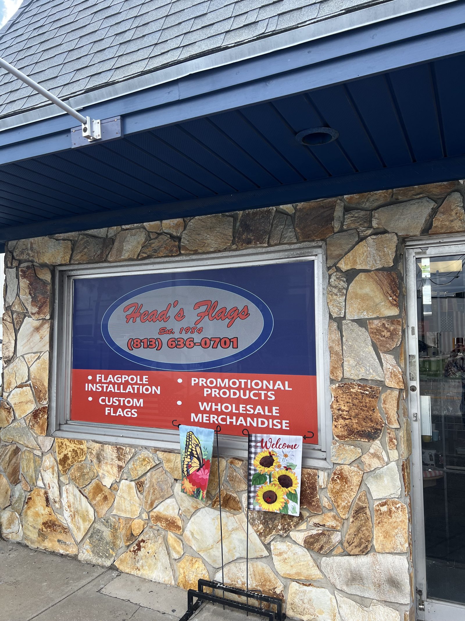 Head's Flags storefront on Henderson Blvd