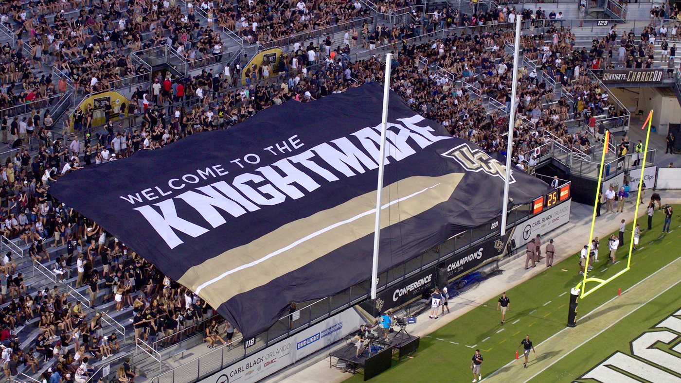 UCF Welcome to the Knightmare crowd surfer banner